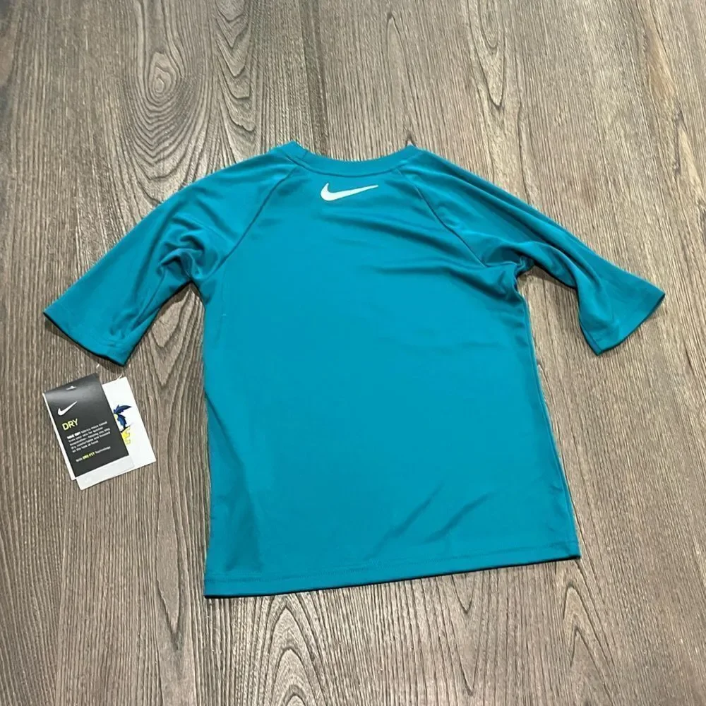 NWT Nike Dri-FIT Kids Teal Long Sleeve Graphic Shirt Size XS